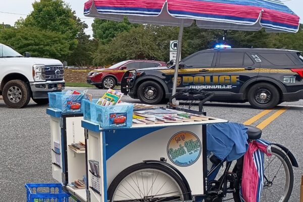 image of the library's book bike at a downtown event.